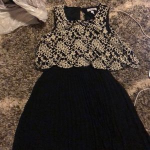 Black and white lace and pleated dress